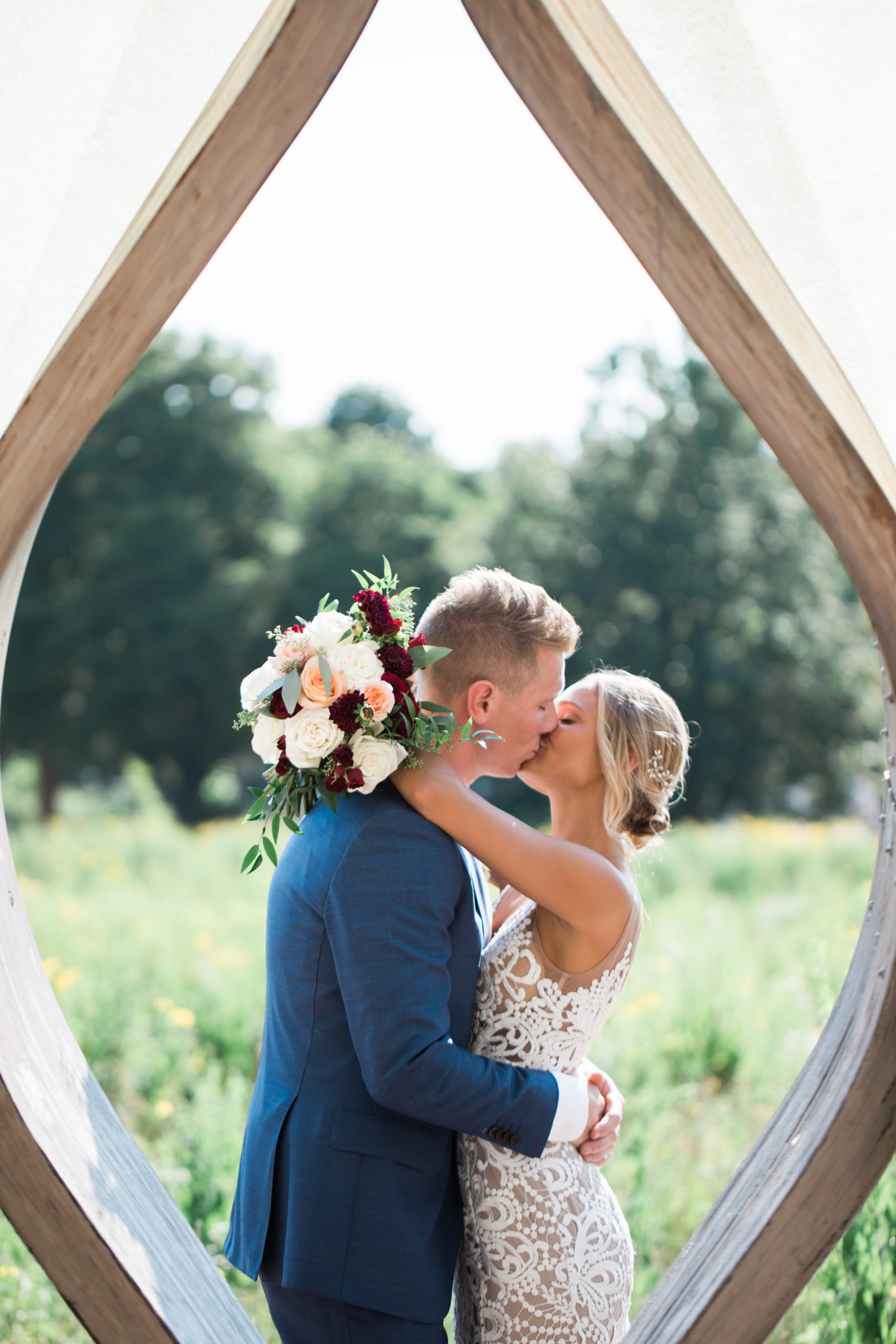 Lincoln Park Wedding Bouquet and Kiss